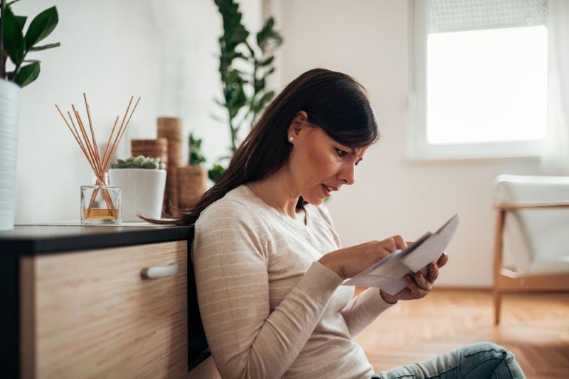 Woman stressed over financial statement